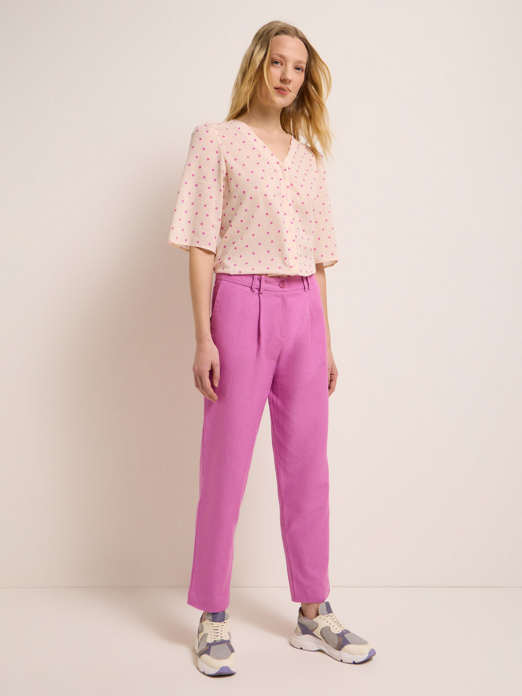 Trousers with pleats